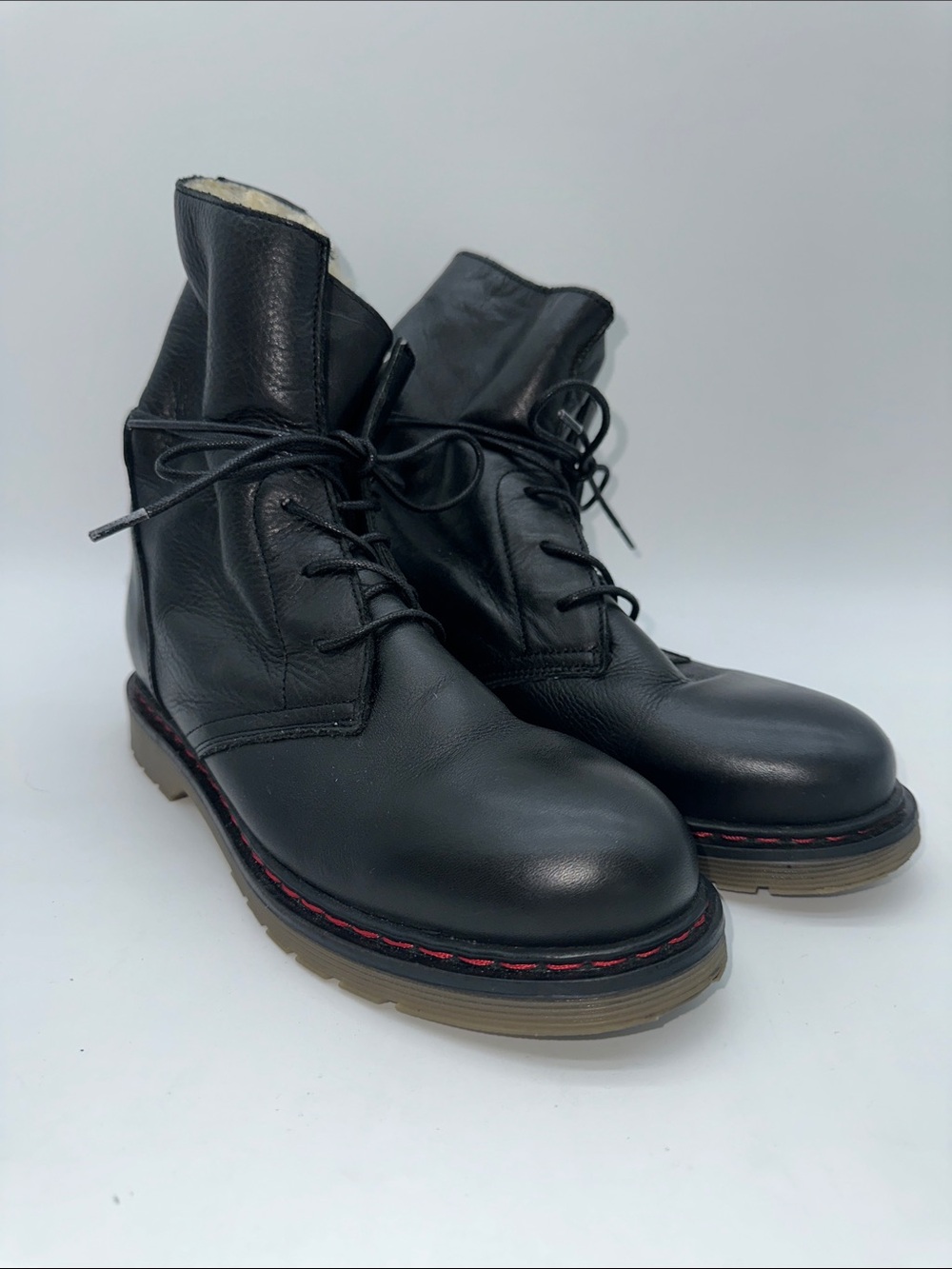 Black Leather Lace-Up Combat Boots with Red Stitching Detail and Sherpa lining
